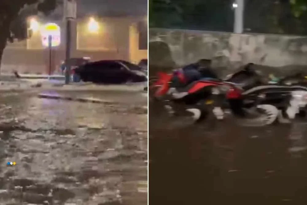Kenderaan terpaksa meredah banjir kilat di Bayan Baru, manakala puluhan motosikal yang diparkir di hadapan sebuah kilang di kawasan Zon Perindustrian Bebas Bayan Lepas ditenggelami air.