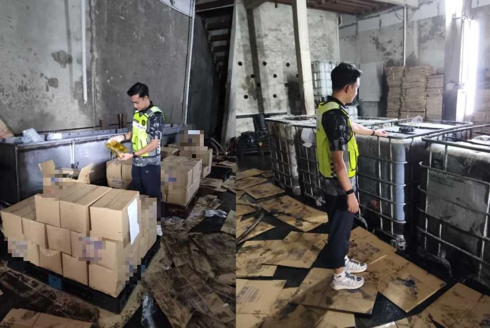 Pegawai KPDN Pulau Pinang memeriksa minyak masak yang disyaki diseleweng bernilai RM20,166.