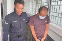 Mohamad Fitri (kanan) dihukum penjara empat tahun dengan satu sebatan selepas mengaku bersalah di Mahkamah Sesyen Ipoh pada Khamis.