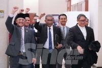 Pemimpin-pemimpin PN hadir ke Mahkamah Tinggi Kuala Lumpur pada Khamis. Rosli Talib