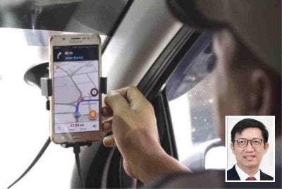Peningkatan tambang bagi setiap perjalanan tidak semestinya menjamin pertambahan pendapatan pemandu. Gambar kecil: Siong Hook
