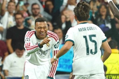 Mbappe (kiri) meledak gol ketiga Real Madrid pada minit ke-83. Foto Agensi