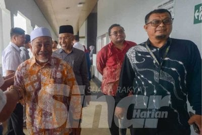 Pemimpin-pemimpin PN hadir ke Mahkamah Tinggi Kuala Lumpur pada Khamis. Rosli Talib 