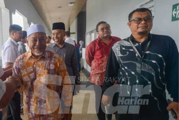 Pemimpin-pemimpin PN hadir ke Mahkamah Tinggi Kuala Lumpur pada Khamis. Rosli Talib 
