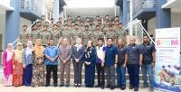Barisan tetamu kehormat merakam gambar kenangan bersama para pelajar Tingkatan Empat MTD yang menyertai Program Pendidikan STEM Sekolah Dalam Kem Tahun 2026 anjuran Yayasan LTAT di Kem Perdana Sungai Besi.