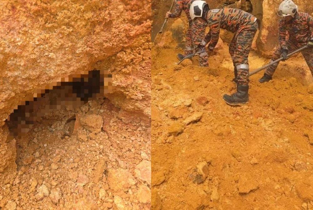 Anggota bomba menjalankan operasi mengeluarkan mangsa lelaki yang tertimbus dalam tanah di Taman Kedidi, Pasir Gudang, pada Sabtu.