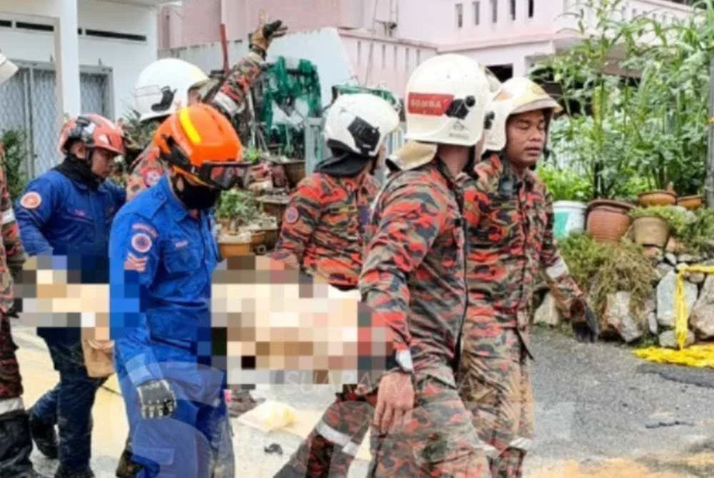 Seorang doktor berusia 73 tahun ditemukan maut selepas tertimbus dalam kejadian tanah runtuh tersebut. Foto SINAR HARIAN/SYAJARATULHUDA MOHD ROSLI