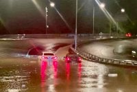Keadaan Lebuhraya Berkembar Bukit Kukus yang dinaiki air susulan hujan lebat sejak malam Sabtu. Foto tular media sosial
