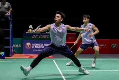 Goh Sze Fei dan Nur Izzuddin berjaya ke perlawanan akhir Terbuka Perancis. Foto Bernama