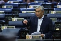 Ahmad Zahid ketika menggulung perbahasan sempena Mesyuarat Ketiga, Penggal Kelima, Parlimen ke-15 di Bangunan Parlimen hari ini. Foto: Bernama 