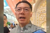 Nga Kor Ming.