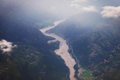 Kemusnahan di sepanjang Sungai Trishuli, daerah Dhading, wilayah Bagmati akibat banjir dahsyat pada Ogos lalu. - Foto Agensi