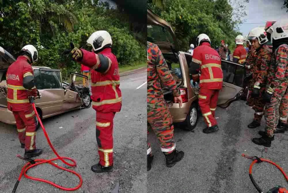 Anggota bomba mengeluarkan mangsa tersepit dalam kenderaan.