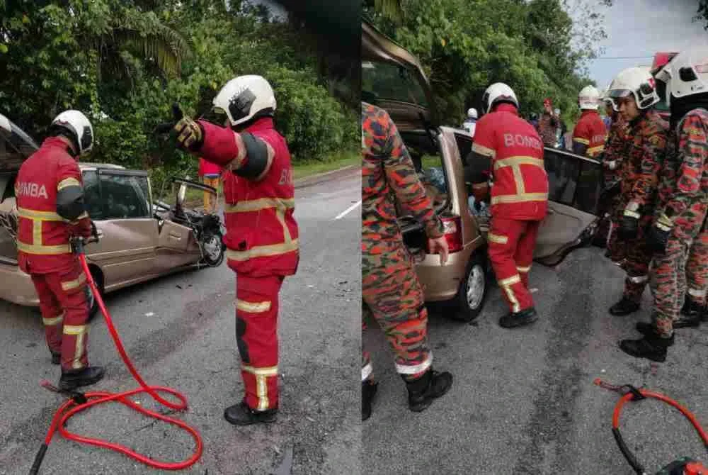 Anggota bomba mengeluarkan mangsa tersepit dalam kenderaan.