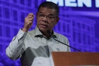 Saifuddin Nasution ketika berucap pada Majlis Perhimpunan Bulanan KDN Bagi Bulan Oktober 2026 di Auditorium Kompleks Setia Perkasa. Foto Bernama