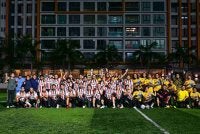 Pasukan JIM Kuala Lumpur (putih) dan pasukan media berentap menerusi perlawanan persahabatan bola sepak di Padang Arena Sukan Kuala Lumpur, pada Rabu.