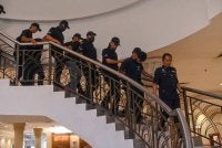 Tertuduh keluar dari Mahkamah Sesyen Kuantan selepas dituduh pada Jumaat.