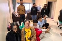 Antara individu yang ditahan dalam serbuan di sebuah rumah mewah di Shah Alam pada Khamis.